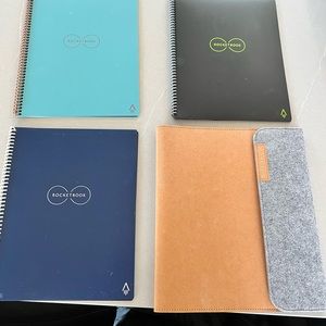 3 Rocket books and folio for rocket books.